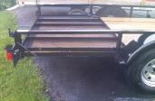 Rear Gate on UT2 folded down onto bed to save fuel when Empty