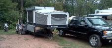 Campsite Setup with Toy Hauler Camper